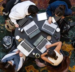 Students on laptops from above